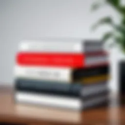A stack of inspirational books on a desk